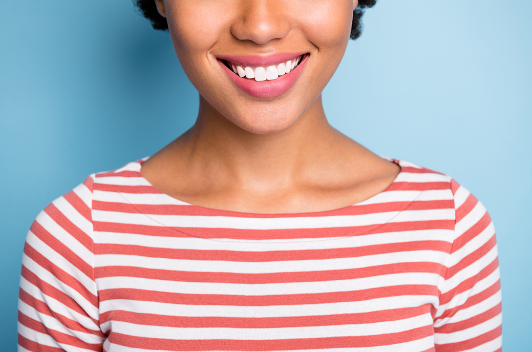 Smiling customer with bright white teeth