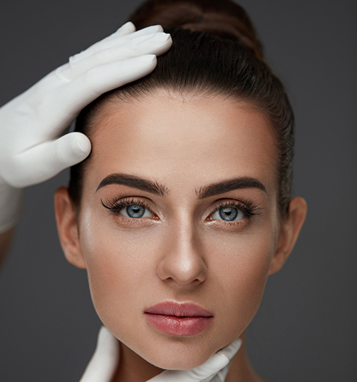 Aesthetics practitioner in Leigh on Sea assessing patient before dermal filler